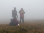 NNAS students planning their route across featureless ground in poor visibility.